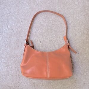 Vintage Nine & Co small orange shoulder bag.
